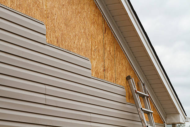 Professional Siding Contractor technician working in Woodmere, NY